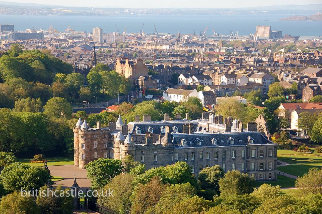 A view of Holyrood House with Edinburgh in the background